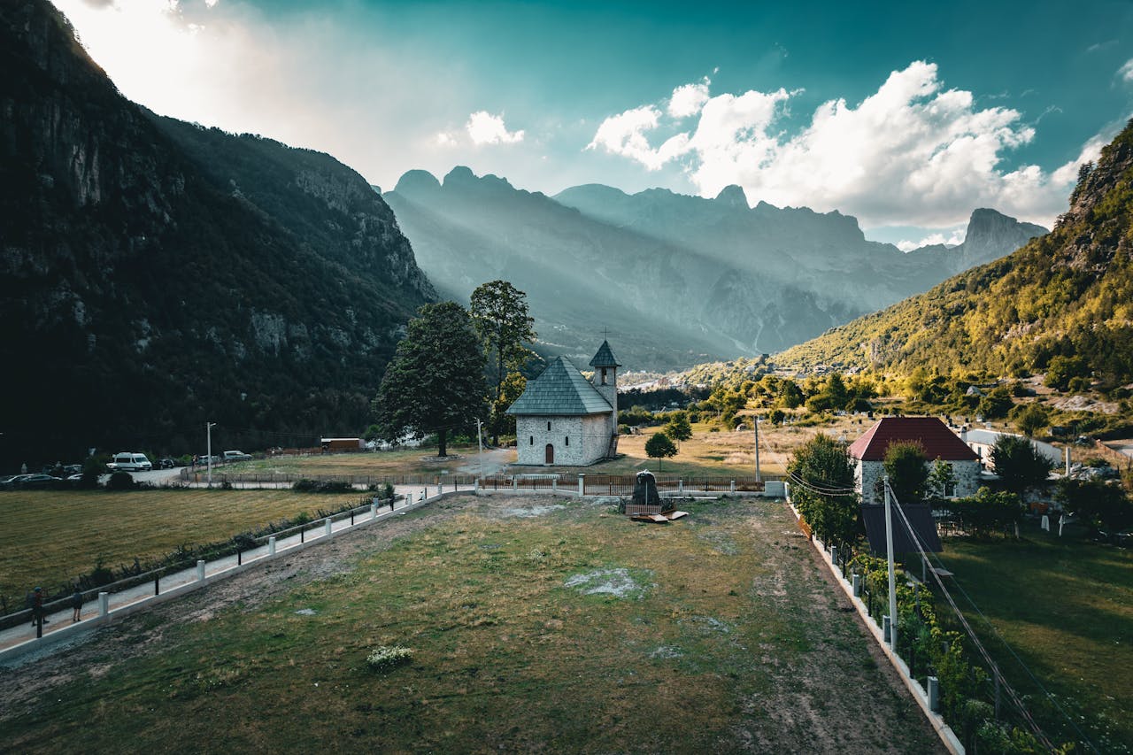 Traditional church and stunning mountain views at Theth National Park
